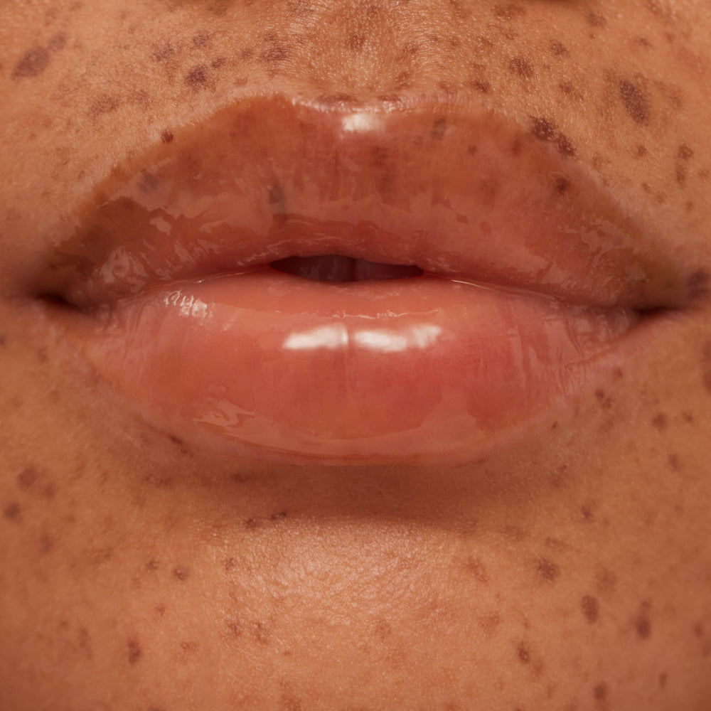 Close-up of a person's lips with visible skin texture